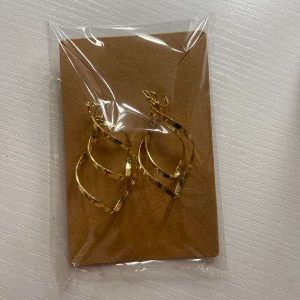 Gold earrings with twisted wire design